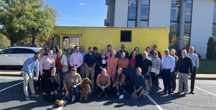 Why Work For WorkRocket - The Team outside with a yellow food truck behind